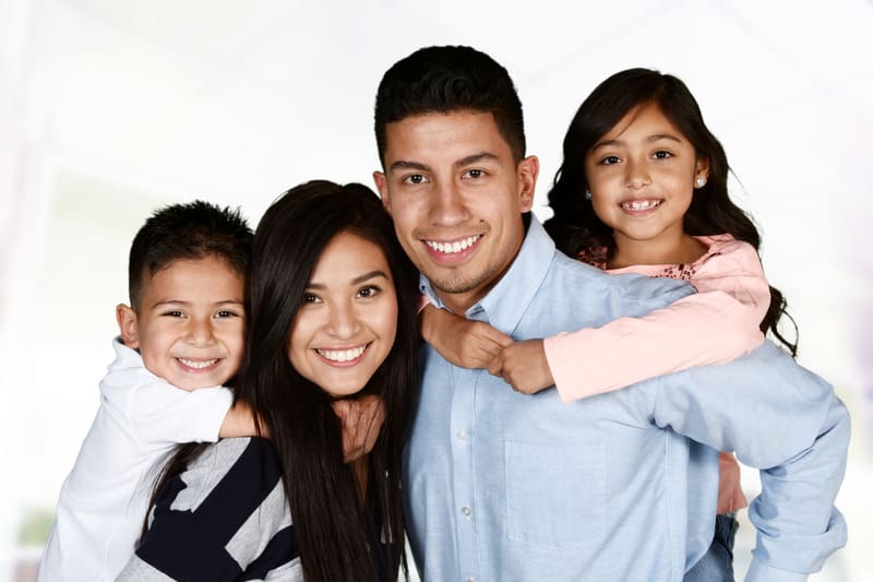 Smiling family with healthy teeth